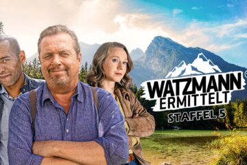 Drei Menschen posieren vor einem Berggipfel, daneben der Schriftzug "Watzmann ermittelt"